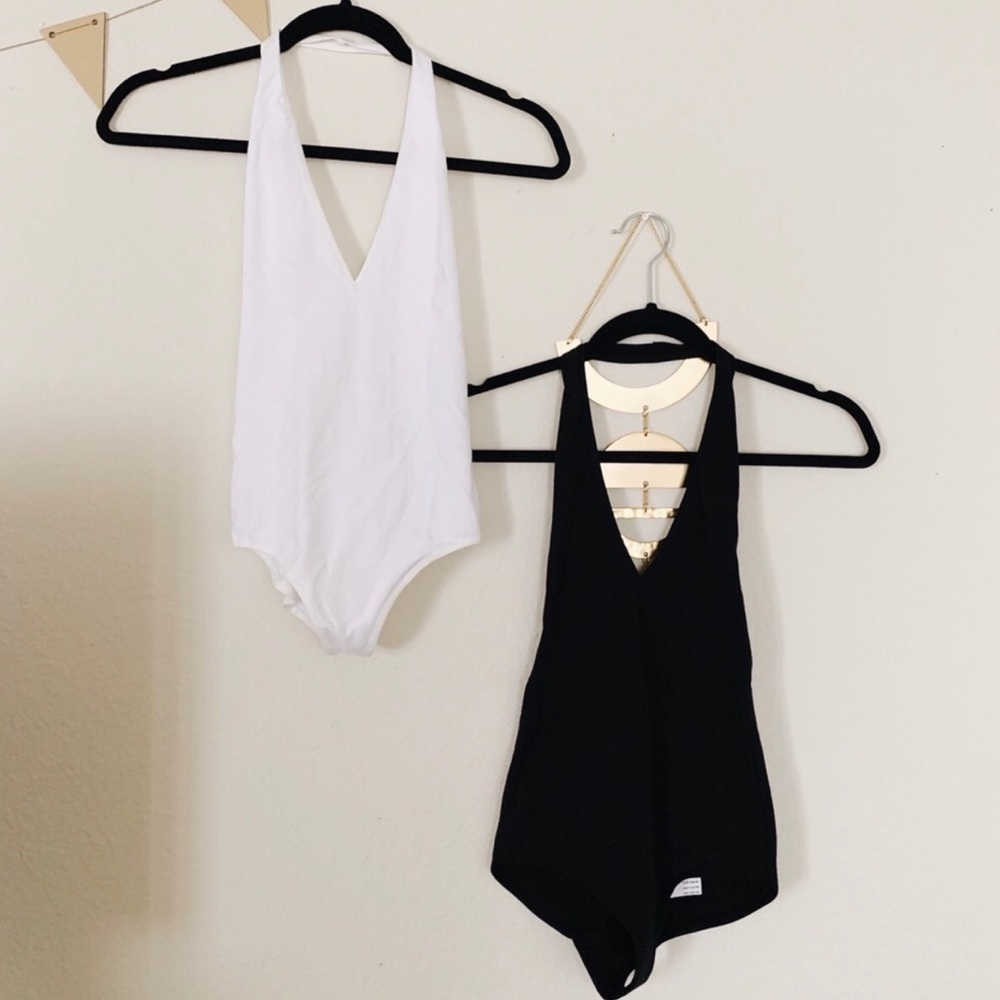 White and black small American apparel bodysuits
